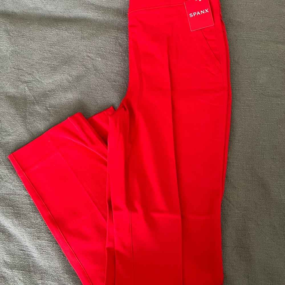 New with tags. Never worn. Bought for $130. SPANX True Red Ankle Slim Pants. XS.